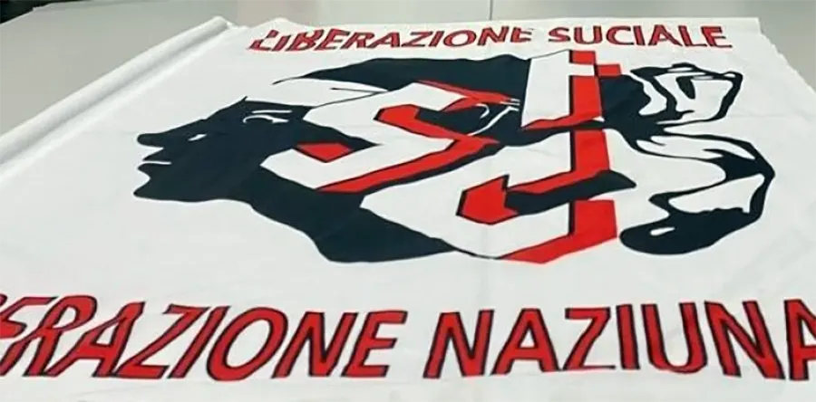 Drapeau du STC : « Libération sociale, libération nationale ». [STC]